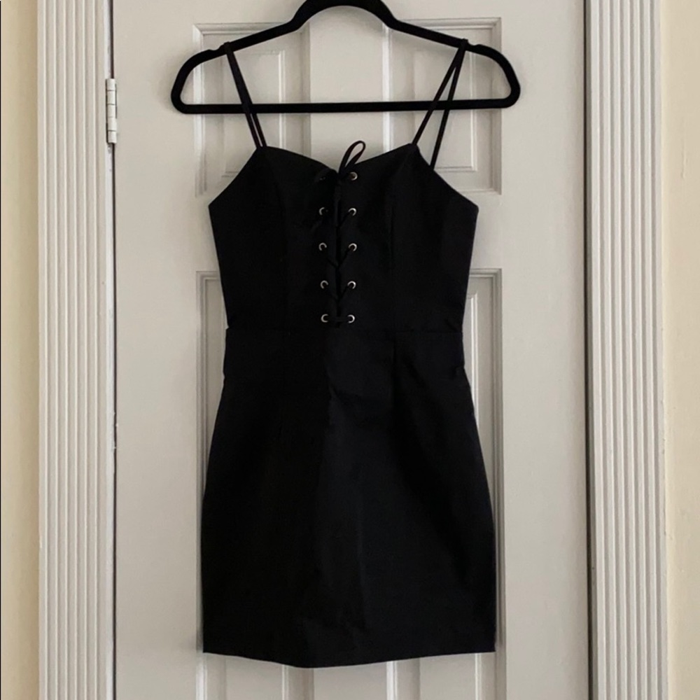 NWT Sexy LF mini dress with lace up front detail!